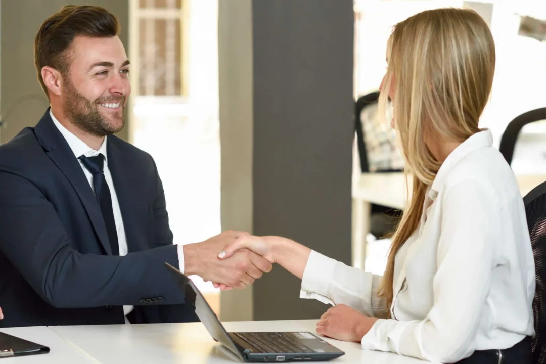 https://cloudaccountants.co/wp-content/uploads/2023/03/smiling-young-couple-shaking-hands-with-insurance-agent-1-scaled-compressed-1080x720.webp